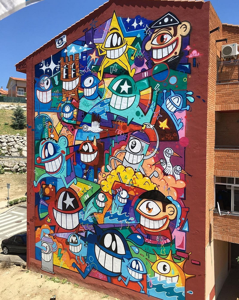 El pez - pintura urbana en la que los protagonistas son peces sonrientes