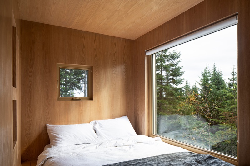 Quinzhee-Architecture-Blok: dormitorio revestido de madera